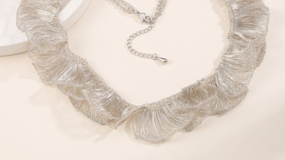 Ruffle Collar Necklace in silver-tone crocheted wire, close view of the ruffle and clasp.