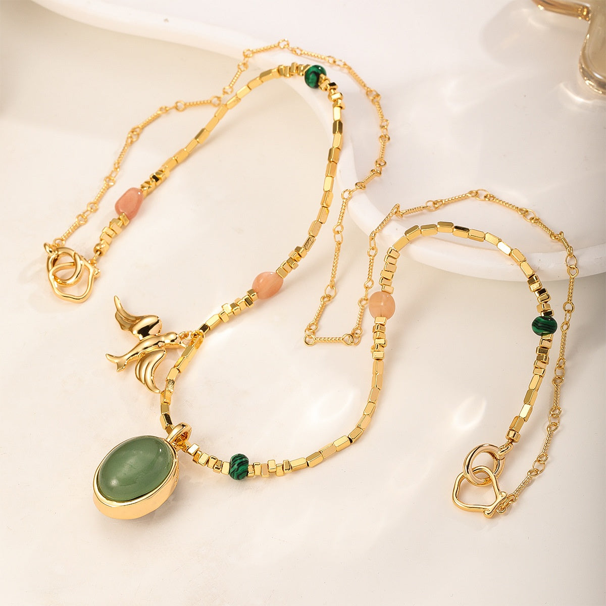 Gold Swallow Necklace — Green & Tiger's Eye, green side