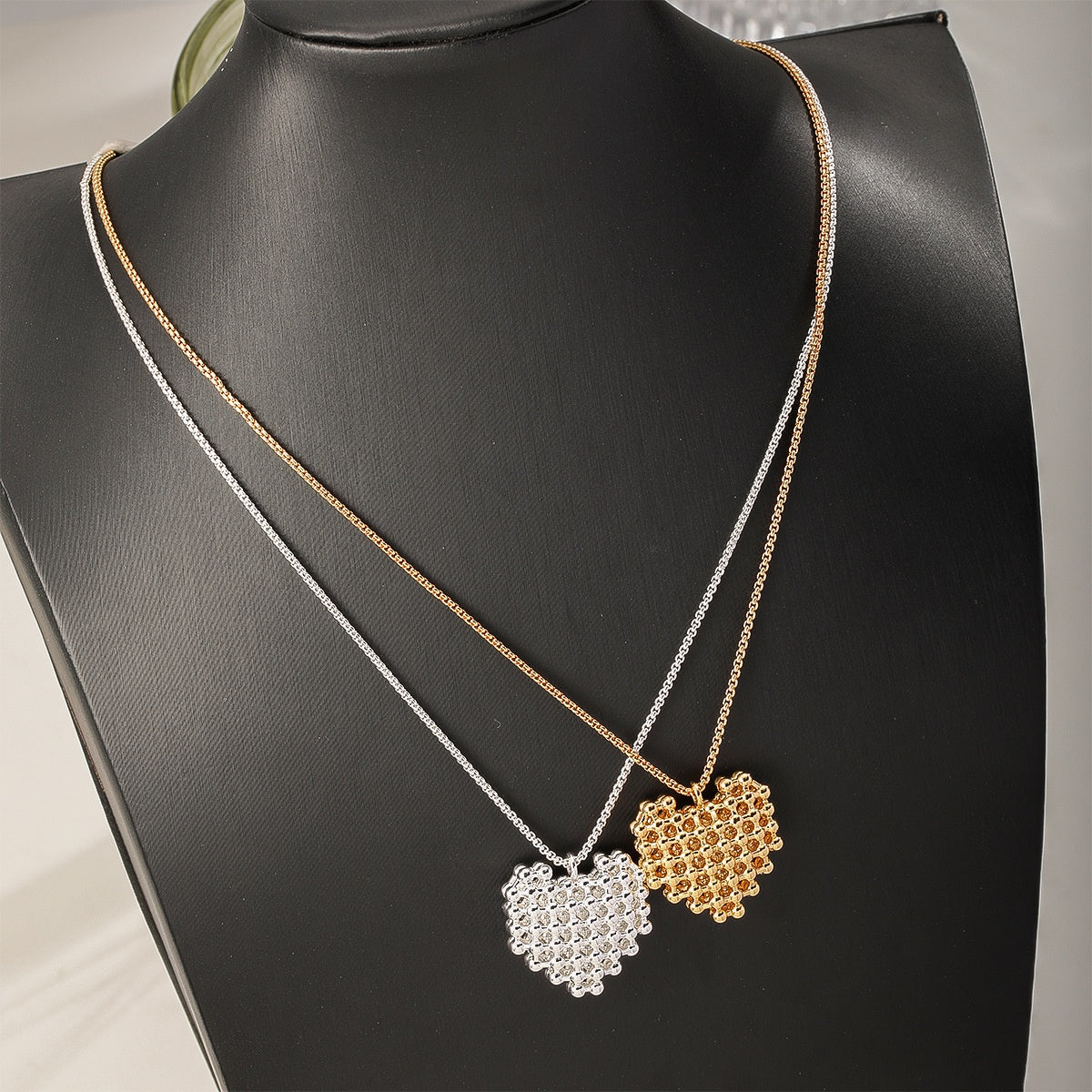 Honeycomb Heart Necklace in Gold and Silver, on a bust