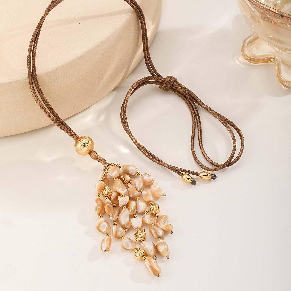 Shell Tassel Necklace — Peach Cream, cord tied in a loop