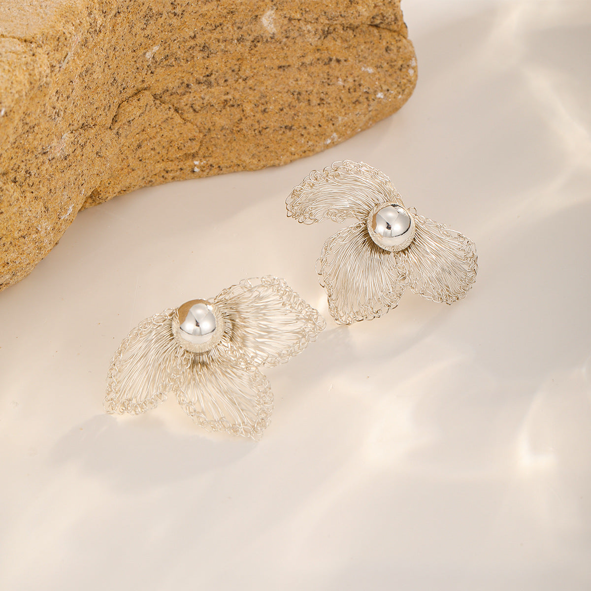 Silver Blossom Studs — Four Petal