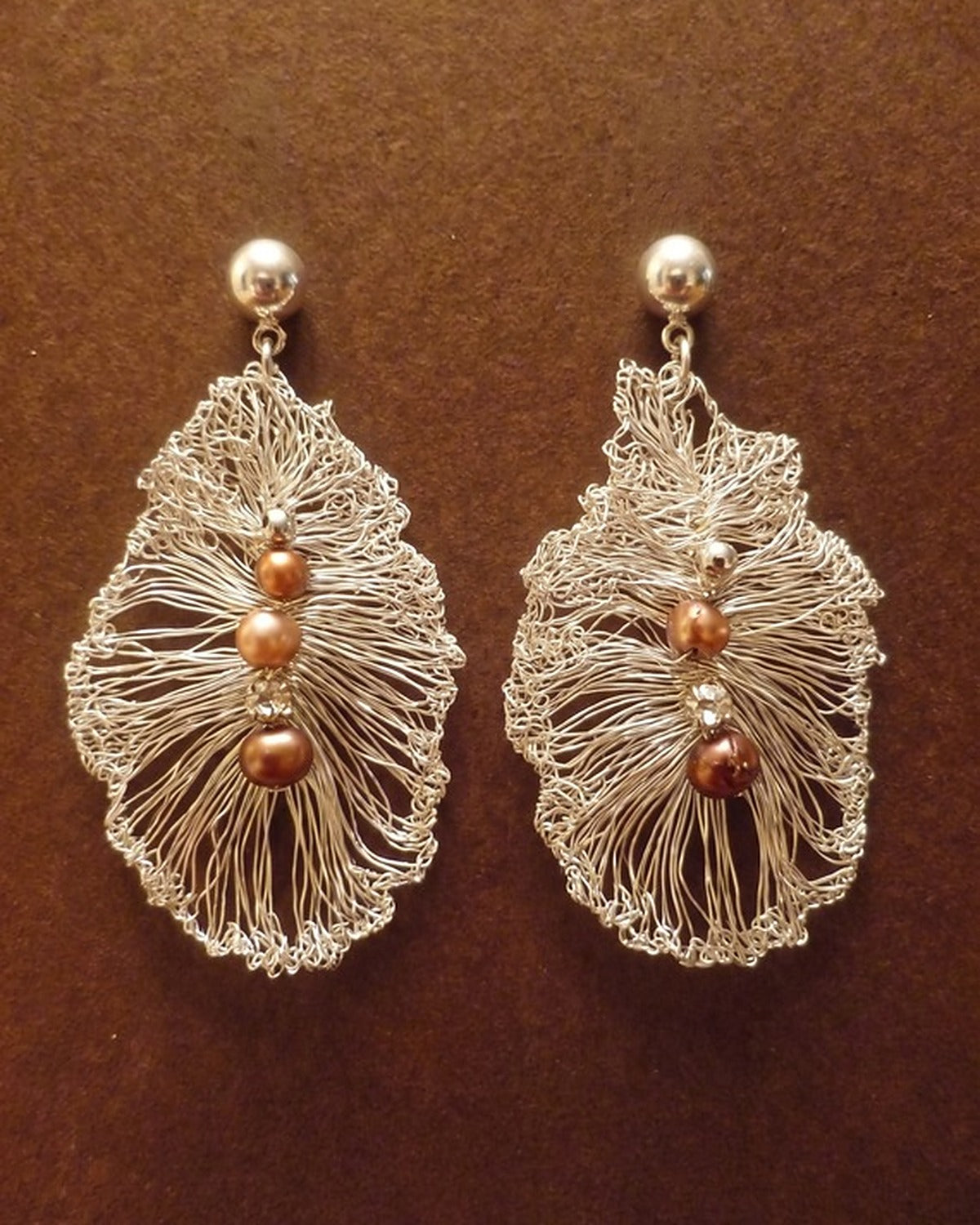 Seeded Leaf Earrings, worn